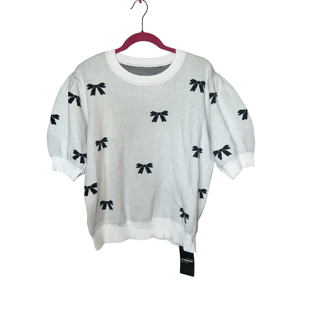 10.-   Women's short sleeve puffy shirt